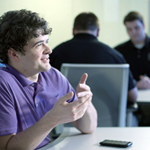 photo of students working together at a table