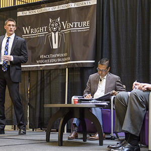 photo of students giving a presentation at the Wright Venture event
